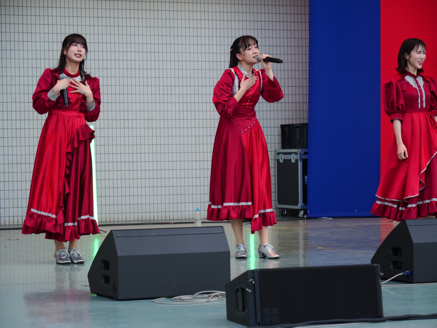 Tokyo stage performers in red